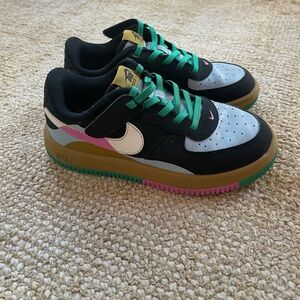 Nike Black and Green Sneakers with Pink Accents